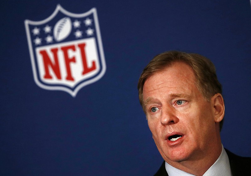 NFL commissioner Roger Goodell tells reporters the NFL team owners have reached agreement on a new league policy that requires players to stand for the national anthem or remain in the locker room during the NFL owner's spring meeting Wednesday, May 23, 2018, in Atlanta.