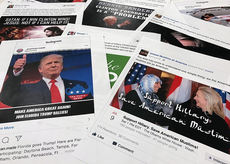 FILE - This Nov. 1, 2017, file photo shows some of the Facebook and Instagram ads linked to a Russian effort to disrupt the American political process and stir up tensions around divisive social issues, released by members of the U.S. House Intelligence committee, are photographed in Washington. Facebook says it will require political advertisers in the U.S. to label “issue ads” that disclose who paid for them, part of its ongoing efforts to prevent elections-related misuse of its platform. Such ads played prominently in Russia’s efforts to interfere in the 2016 U.S. elections. (AP Photo/Jon Elswick, File)