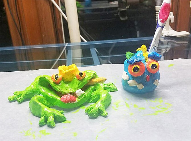 The frog was created by London Lee Rosenbum, 4, and the monster was made by Nathan Gage Rosenbum, 8. Both had help from their grandmother, I. Lynn Garriott Porter, Art House gallery manager.