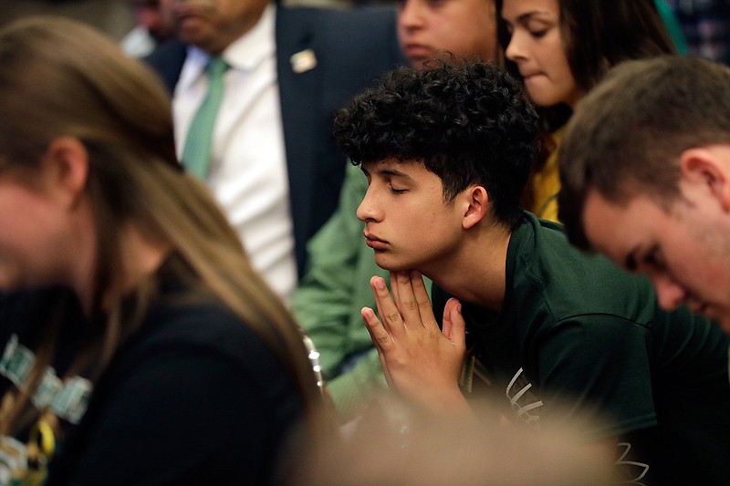 Santa Fe students takes part in a roundtable discussion Thursday in Austin hosted by Texas Gov. Gregg Abbott to address safety and security at Texas schools in the wake of the shooting at Santa Fe, Texas. (Associated Press)
