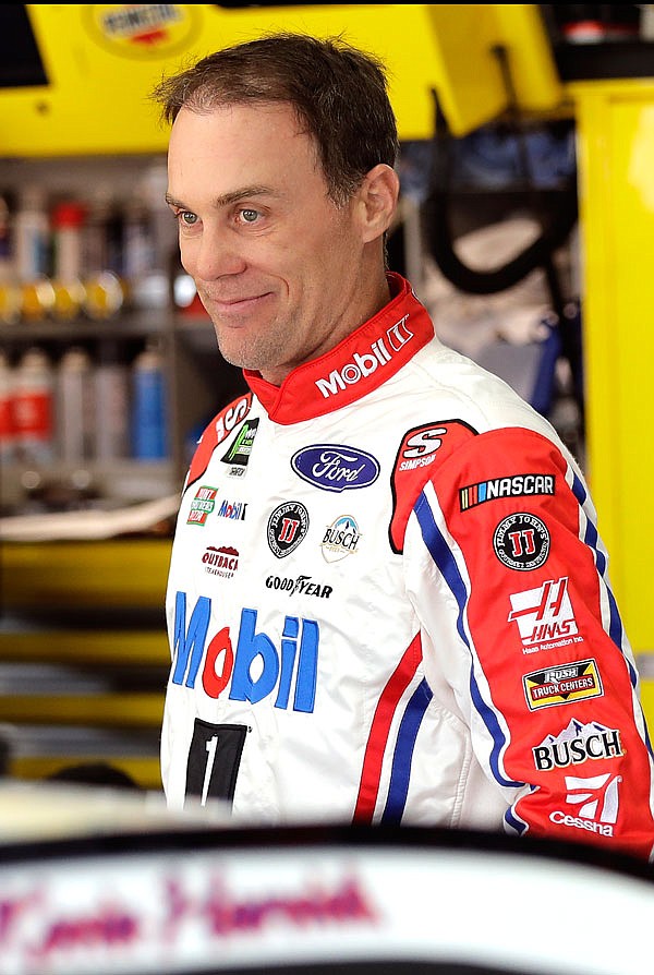 Kevin Harvick smiles as he prepares for practice for today's Coca-Cola 600 at Charlotte Motor Speedway in Concord, N.C.