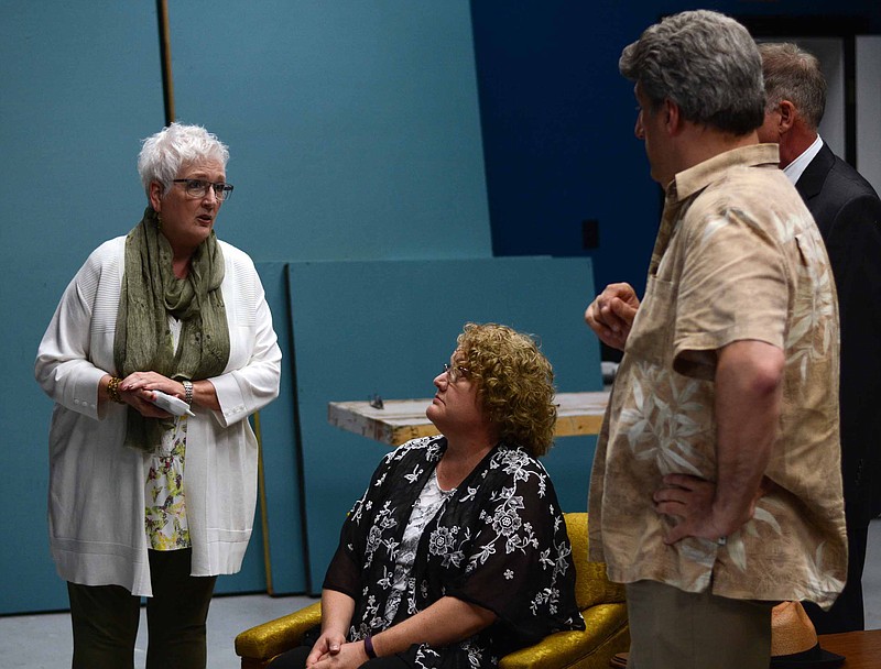 (Photo by Adam Cole - The News Tribune) Claudia Scott, left, who plays Senator Feldman, works a scene of "At First Sight" with Carrie Peter, Brian Harper and Jeff Ball at a rehearsal on Thursday, May 24. 