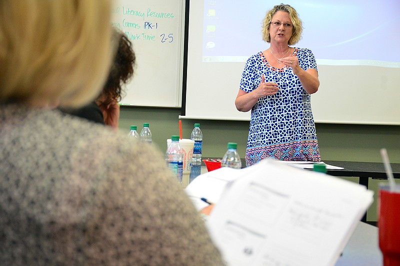 Mark Wilson/News Tribune
Donna Johnson, a tutor trainer, leads a seminar for Jefferson City Public Schools officials during an ABLE program for Administrative Council Tuesday. Currently ABLE serves 30 MS students annually. 