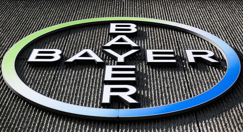 This Monday, May 23, 2016, file photo shows the Bayer AG corporate logo displayed on a building of the German drug and chemicals company in Berlin.