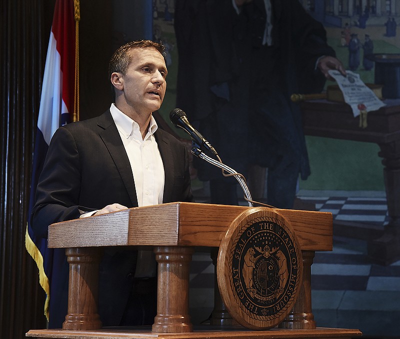 Gov. Eric Greitens reads from a prepared statement as he announces his resignation effective 5 p.m. Friday, June 1, 2018, during a hastily called press conference Tuesday, May 29, 2018, in his Capitol office in Jefferson City, Missouri.
