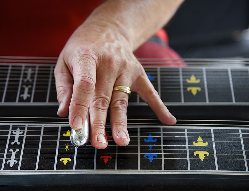 
Steve Vernon plays his pedal steel guitar at the 25th annual Testicle Festival on Saturday, June 2, 2018 in downtown Olean, Mo.