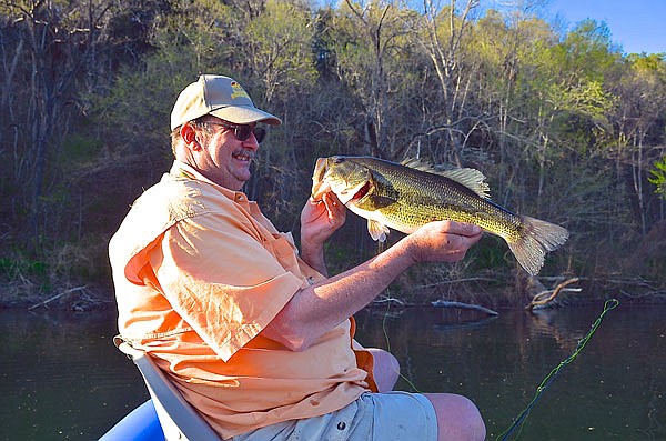 Bobby Whitehead, editor of The Outdoor Guide, with a nice catch from the Big Piney River.