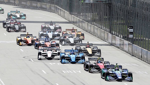 Alexander Rossi leads the field at the start of the second race Sunday of the IndyCar Detroit Grand Prix in Detroit.