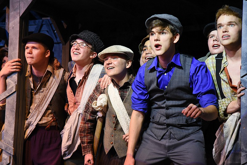 Emil Lippe/News Tribune
Characters await the release of the latest headline during a dress rehearsal for the Capital City Production “Newsies” at Shikles Auditorium on Monday, June 4, 2018. 