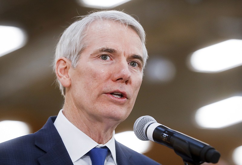 FILE - In this April 16, 2018, file photo, Sen. Rob Portman, R-Ohio, speaks during a news conference in Cincinnati. The Obama administration secretly sought to give Iran brief access to the U.S. financial system by sidestepping sanctions kept in place after the 2015 nuclear deal, despite repeatedly telling Congress and the public it had no plans to do so. That’s according to an investigation by Senate Republicans released June 6. “The Obama Administration misled the American people and Congress because they were desperate to get a deal with Iran,” said Portman, the subcommittee’s chairman. (AP Photo/John Minchillo, file)