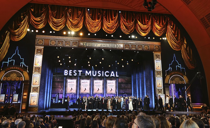 The cast and crew of "The Band's Visit" accept the award for best musical at the 72nd annual Tony Awards at Radio City Music Hall on Sunday, June 10, 2018, in New York. (Photo by Michael Zorn/Invision/AP)