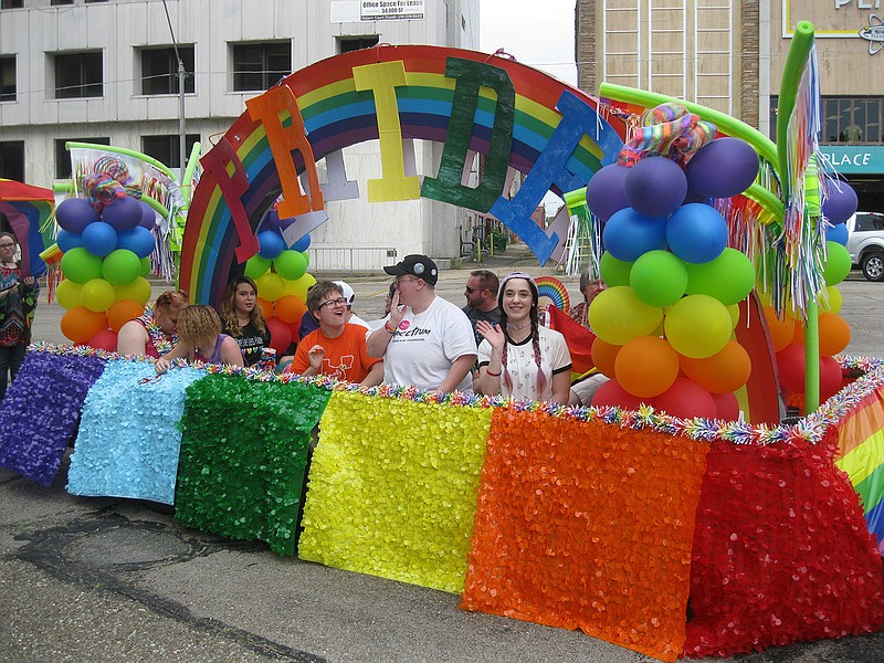 Parade participants gather in one of the lead floats Saturday at the second annual Day of Pride Parade in downtown Texarkana. The participants consisted of many members of Equality Texarkana, a local group organized to work on discrimination issues facing the LGBTQ community. The group was founded locally two years ago. In addition to the parade, there was live entertainment, speeches and vendors.