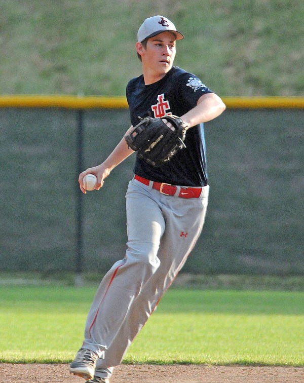 Jefferson City Post 5 Juniors second baseman Gavin Bernskoetter gets set to throw a runner out at first base during Saturday night's game against the Missouri Gators at Vivion Field.