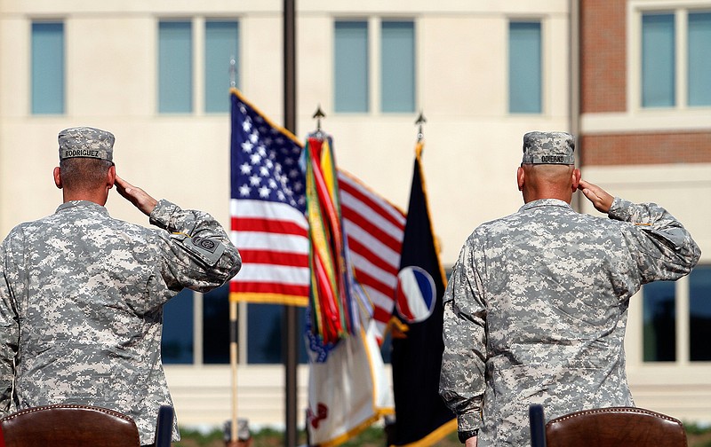 Generals salute during an installation ceremony on Sept. 12, 2011, at the U.S Army Forces Command at Fort Bragg, N.C., one the Army's three major command headquarters. The Army is scouting large cities in 2018 to find a home for a fourth command headquarters, one that would be near experts in technology and innovation who can help focus on the Army's future. The site is expected to be announced by the end of June.