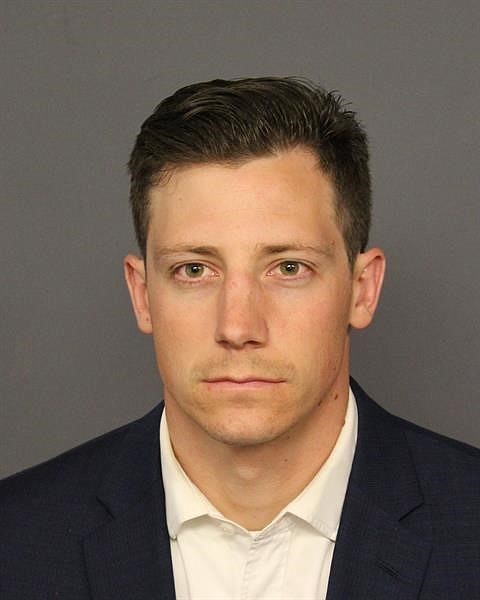 This photo provided by the Denver Police Department shows Chase Bishop. Bishop turned himself in to the Denver Sheriff's Department Tuesday, June 12, 2018, and is being held for Investigation of 2nd Degree Assault. Police have said Bishop was dancing at a downtown club on June 2 when the gun fell from the agent's waistband holster onto the floor. The firearm went off when the agent picked it up. (Denver Police Department  via AP)