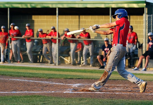 Hayden Hirschvogel of the Jefferson City Post 5 Seniors smacks a single to center field during the fourth inning of Monday's game against Eureka at the American Legion Post 5 Sports Complex.