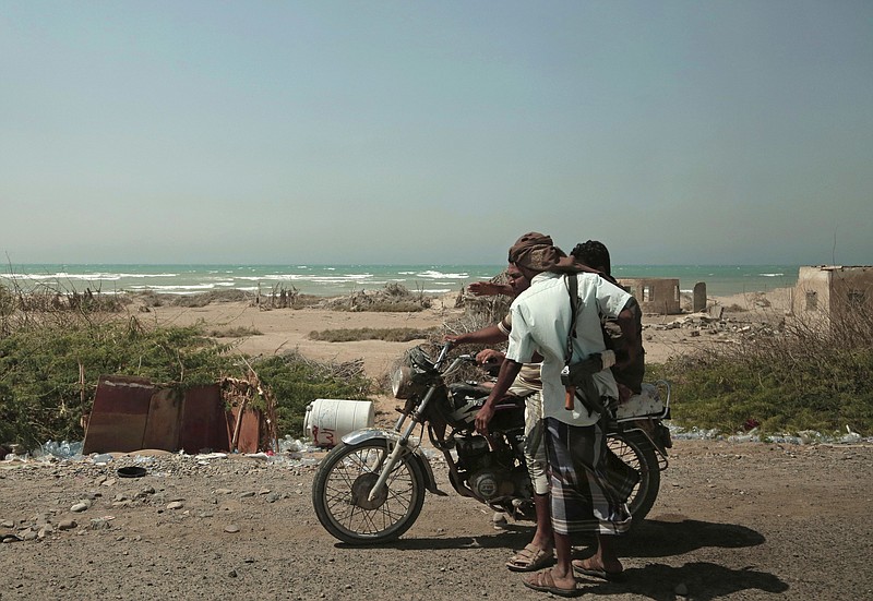 FILE - In this Feb. 12, 2018 file photo, Saudi-backed forces, part of Ahmed al-Kawkabani's, southern resistance unit in Hodeida, patrol in Hodeida, Yemen. The Saudi-led coalition backing Yemen's exiled government began an assault Wednesday, June 13, 2018 on the port city of Hodeida, the main entry point for food in a country already teetering on the brink of famine.(AP Photo/Nariman El-Mofty, File)