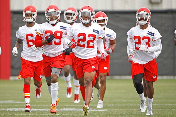 Chiefs defensive backs Eric Berry (29), Robert Golden (22) and Kendall Fuller (23) run during Tuesday's practice in Kansas City.