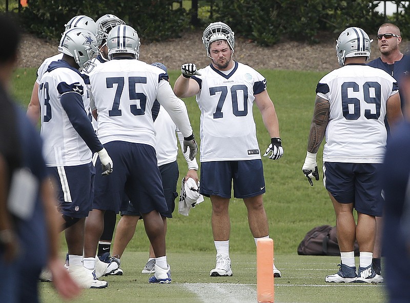Dallas Cowboys offensive guard Zack Martin (70) participates in a practice at the NFL football team's training camp in Frisco, Texas, Tuesday, June 12, 2018. (AP Photo/Brandon Wade)