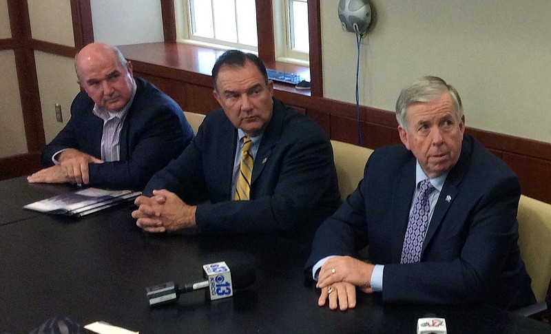 Shelter Insurance CEO Rick Means, left, Missouri Senate Majority Leader Mike Kehoe, second from left; and Gov. Mike Parson met with University of Missouri leaders Wednesday, June 13, 2018 during a tour of the MU campus in Columbia.