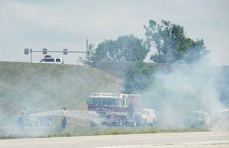 The Jefferson City Fire Department responded several units to a natural cover fire in the median of U.S. 54, just south of the Ellis Boulevard overpass, on Wednesday, June 13, 2018. There were several spot fires from an unknown origin in the grass that stretched from the Route OO-AA overpass in Holts Summit to just north of the Missouri 179 overpass. The Holts Summit Fire Department also dispatched multiple units to combat the fire to keep the dry grass from burning out of control.