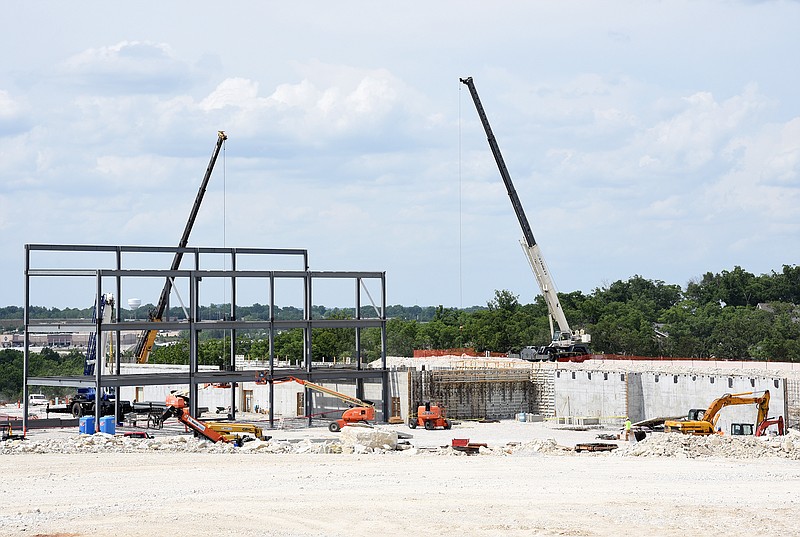 Crews continue construction for Capital City High School near Mission Drive on Thursday, June 14, 2018.