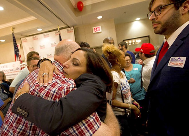 State Rep. Katie Arrington hugs supporters as she defeated U.S. Rep. Mark Sanford at the DoubleTree by Hilton Hotel for Katie Arrington's results party on Tuesday, June 12, 2018, in North Charleston, S.C.