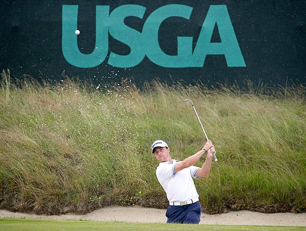 Cole Miller hits out of a bunker during a practice round Wednesday for the U.S. Open in Southampton, N.Y.