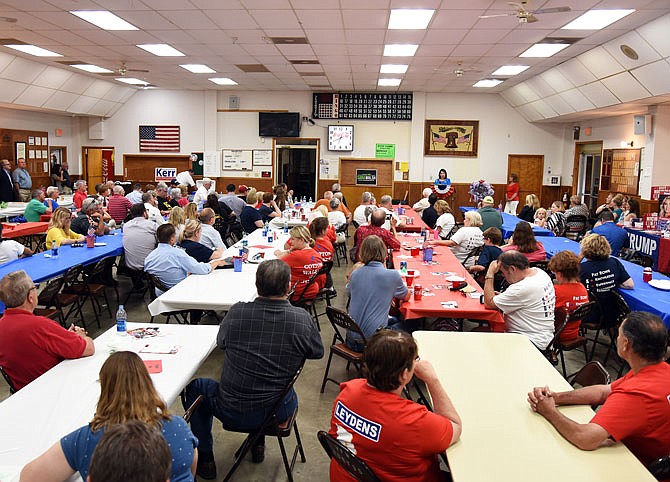 Candidates and voters listen to Judy Ridgeway talk about her platform during the Cole County Republican Candidate Forum Thursday, June 14, 2018 at the Veterans of Foreign Wars Post 35 in St. Martins. 