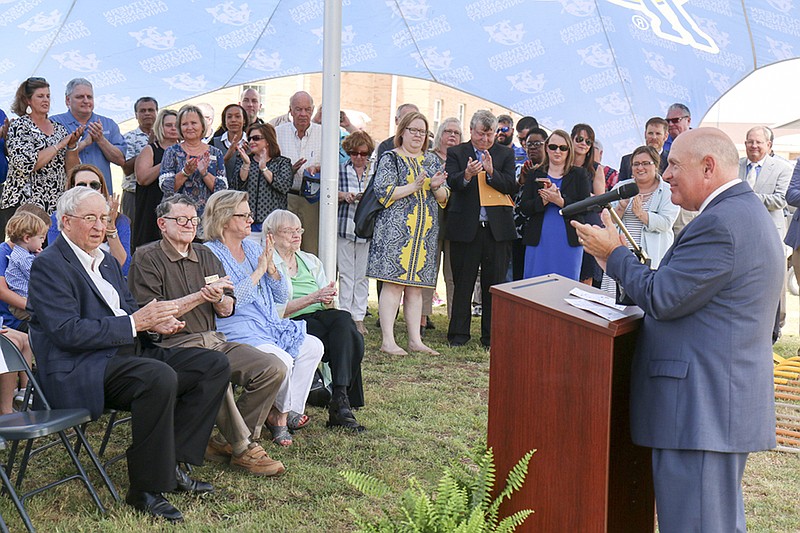 Dr. Trey Berry, president of Southern Arkansas University, speaks Monday at the groundbreaking for a new residence hall at SAU. Pictured are, left to right: Dr. Bob Burns, chairman of Farmers Bank & Trust, Lawrence Bearden, secretary, SAU Board of Trustees, Molly Burns and Mary Harsh. (Submitted photo)
