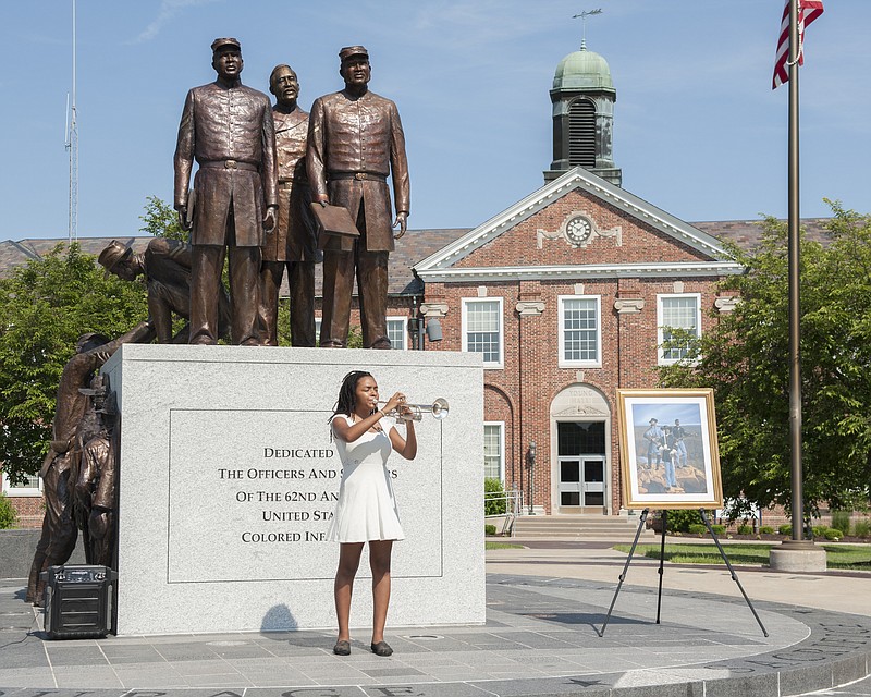 
Sydney Flowers, a Jefferson City High School student, performs the National Anthem on trumpet at the start of the Juneteenth Emancipation Program at Lincoln University Soldiers Memorial Plaza on Saturday, June 16, 2018.