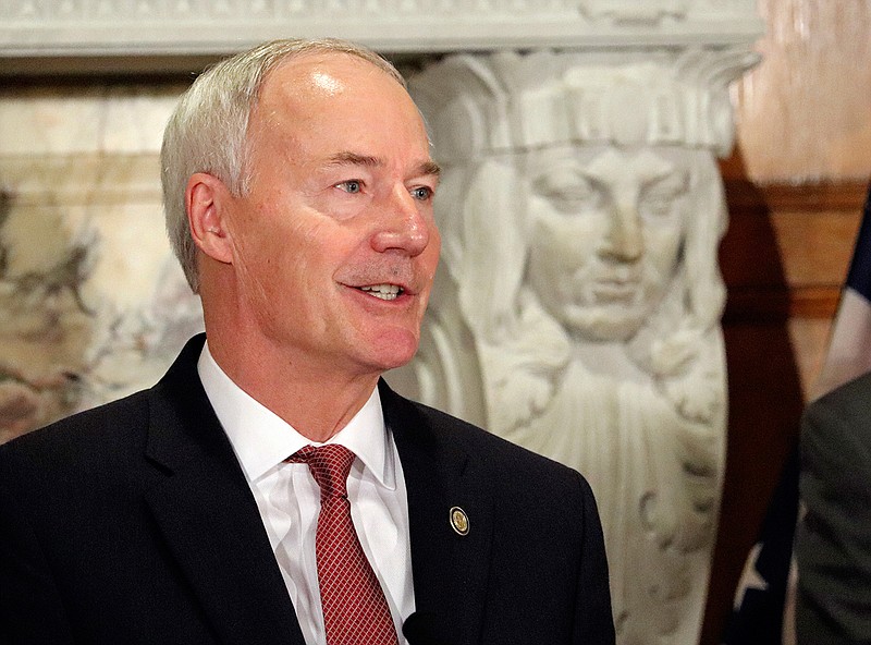 Arkansas Gov. Asa Hutchinson speaks March 1, 2018, at a state Capitol news conference in Little Rock. In an appearance Friday before the state Bar Association in Hot Springs, Ark., Hutchinson said he supported tougher ethics rules for state legislators, which include a nephew, Sen. Jeremy Hutchinson, who has been implicated in a recent federal court case.