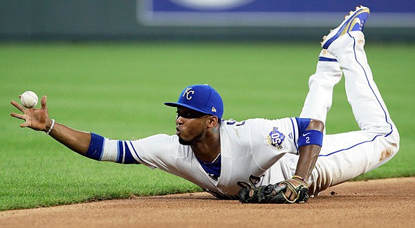 Royals shortstop Alcides Escobar knocks down a ball hit by Carlos Correa of the Astros during the sixth inning of Friday night's game at Kauffman Stadium. Correa was credited with a single on the play.