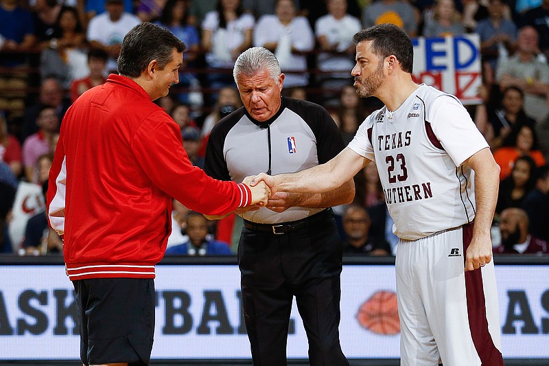 Sen. Ted Cruz and Jimmy Kimmel shake hands before the Blobfish Basketball Classic and one-on-one interview Saturday, June 16, 2018, at Texas Southern University's Health & Physical Education Arena in Houston. Cruz challenged Kimmel to the game after Kimmel blamed the Houston Rockets playoff loss on the senator. Cruz won 11-9.