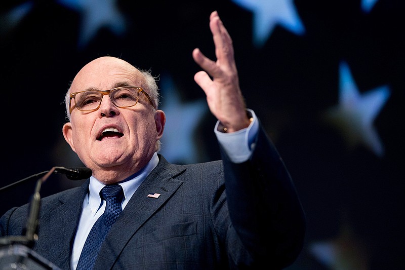 In this May 5, 2018, file photo, Rudy Giuliani, an attorney for President Donald Trump, speaks at the Iran Freedom Convention for Human Rights and democracy in Washington. Giuliani said Sunday, June 17, 2018, that President Donald Trump might pardon former campaign chairman Paul Manafort and others ensnared in the Russia investigation once special counsel Robert Mueller's work is finished, calling it unnecessary for now as the White House seeks to push a rapid end to the year-long probe. (AP Photo/Andrew Harnik, File)