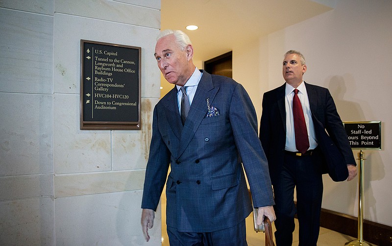 In this Sept. 26, 2017, file photo, longtime Donald Trump associate Roger Stone arrives to testify before the House Intelligence Committee, on Capitol Hill in Washington. Special Counsel Robert Mueller is examining previously undisclosed contact between former Trump campaign officials and a Russian figure alleged to have tried to sell them dirt on Hillary Clinton during the 2016 campaign. But Stone and Michael Caputo say they believe the man was an FBI informant trying to set them up. He denied that to the Washington Post. 