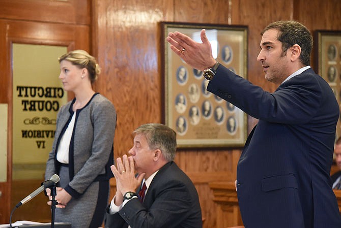 Attorney Mark Pedroli argues Tuesday, June 20, 2018 that Confide servers may still house text messages sent between former Gov. Eric Greitens and his staff. Also pictured in Judge Jon Beetem's Cole County Circuit Court room is Barbara Smith and Robert Thompson, center, who represent the Office of the Governor and custodian of records. 