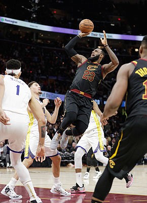 LeBron James of the Cavaliers goes up for a shot during Game 3 of the NBA Finals earlier this month against the Warriors in Cleveland.