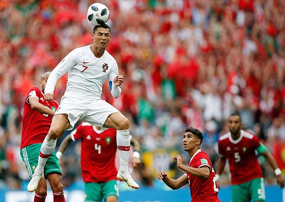 Cristiano Ronaldo of Portugal leaps up for a header Wednesday during a Group B match against Morocco in Moscow.