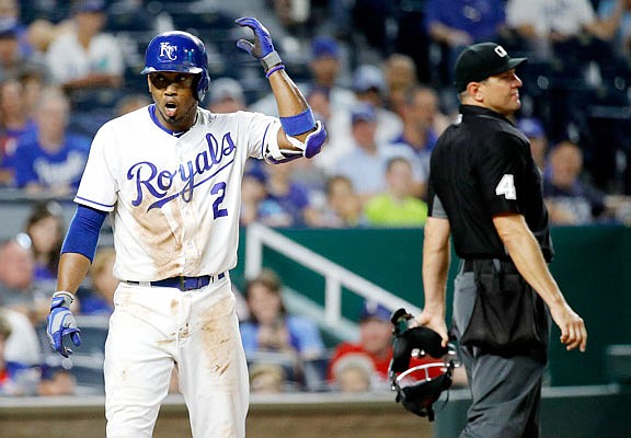 Alcides Escobar of the Royals reacts after being ejected by home plate umpire Chad Fairchild during the eighth inning of Wednesday night's game at Kauffman Stadium.