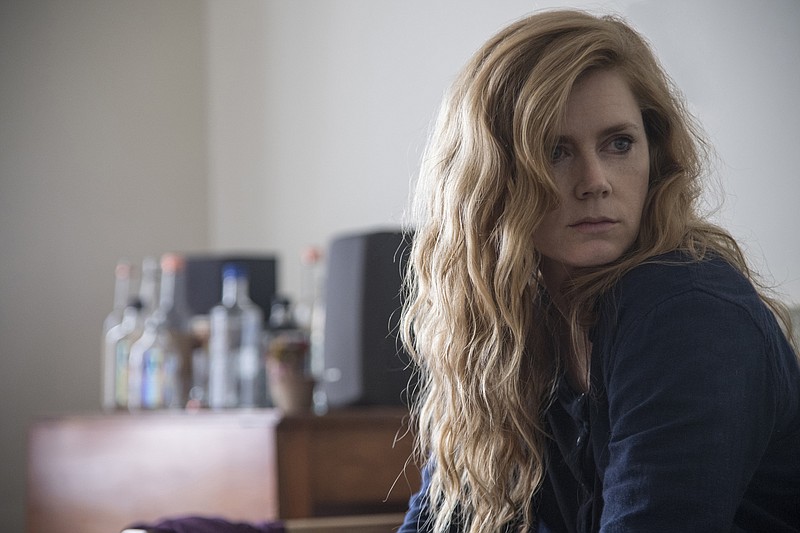 This image released by HBO shows Amy Adams in a scene from the series "Sharp Objects," premiering July 8 on HBO. (Anne Marie Fox/HBO via AP)