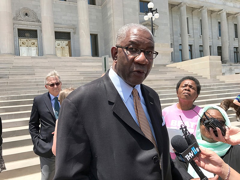 In this June 9, 2017 photo, Circuit Judge Wendell Griffen speaks at a news conference on the steps of the Arkansas State Capitol in Little Rock, Ark. The Arkansas Supreme Court on Thursday, June 21, 2018, cleared the way for the state to launch its medical marijuana program, reversing and dismissing Griffen's ruling that prevented officials from issuing the first licenses for businesses to grow the drug. Griffen ruled in March that the state's process for awarding medical marijuana cultivation licenses was unconstitutional. (AP Photo/Andrew DeMillo, File)