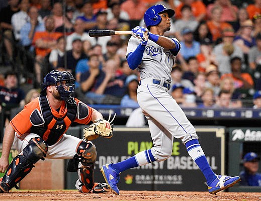 Rosell Herrera of the Royals watches his RBI triple during the ninth inning of Friday night's game against the Astros in Houston.