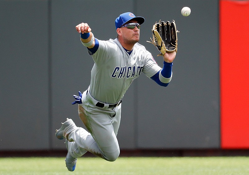 Chicago Cubs center fielder Albert Almora Jr. catches a fly-out by Cincinnati Reds' Joey Votto in the fourth inning of a baseball game Sunday in Cincinnati.