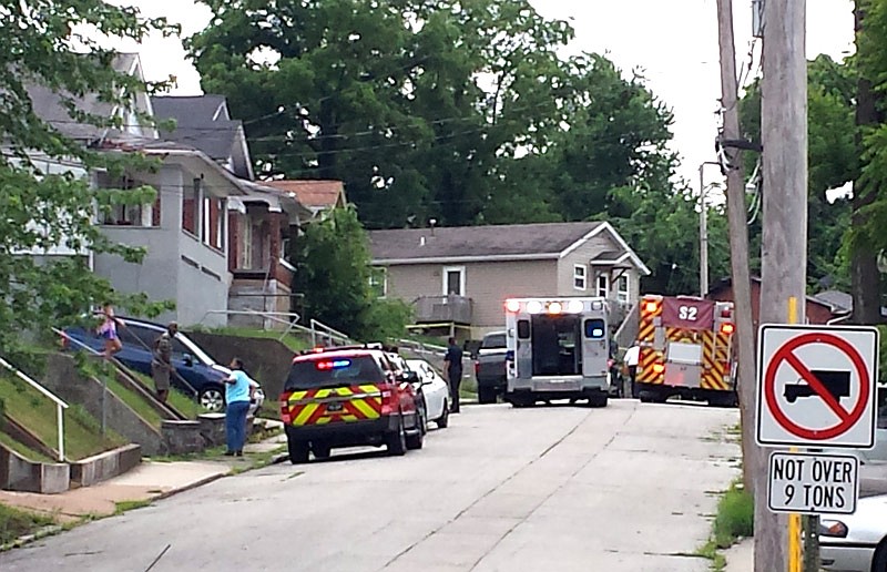 Jefferson City police and emergency personnel are shown in the 700 block of Walsh Street where a person was shot Wednesday afternoon, June 27, 2018.