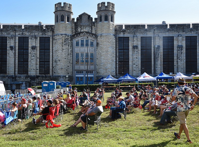 
Audience members relax and enjoy live music by Crossroad Station during the Inside The Walls concert series at the Missouri State Penitentiary on Saturday, June 30, 2018. This is the third year that the Inside the Walls concert series has been held at the Missouri State Penitentiary.
