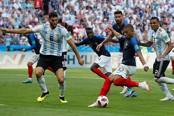 France's Kylian Mbappe scores a goal during Saturday's round of 16 World Cup match against Argentina in Kazan, Russia.