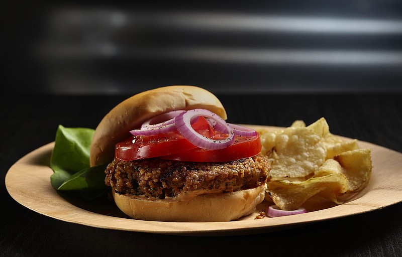 This quinoa-based vegetarian burger is adapted from the just-released cookbook by Brooks Headley, "Superiority Burger Cookbook" named for the chef's Manhattan restaurant. (Abel Uribe/Chicago Tribune/TNS)