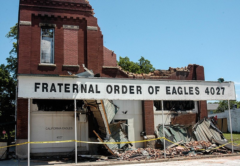 The remaining shell of the Eagles Club Aerie 4027 cautiously was razed June 29, 2018, after fire destroyed the building June 24-25.