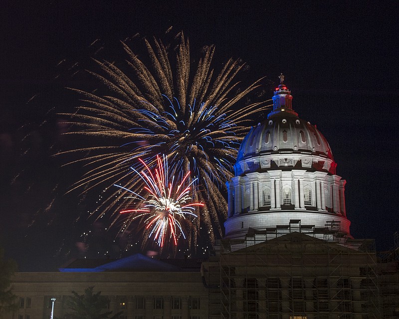 
The Salute to America Red, White and Boom Fireworks Sky Concert illuminates the sky behind the Missouri State Capitol Building on Wednesday, July 4, 2018.